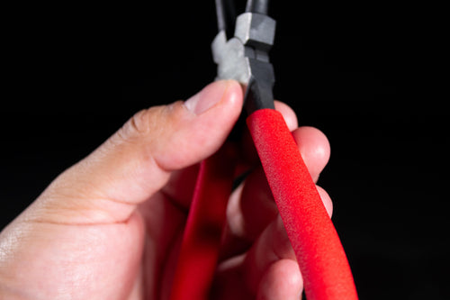 You need a one-handed hook that grabs tabs