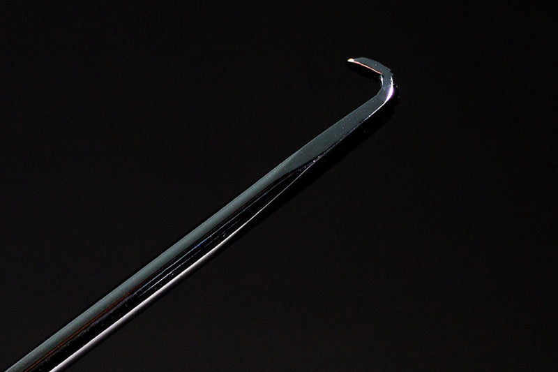 Side profile of an Olsa Tools flat pick and hook.