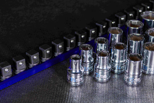 Magnetic rails lock sockets in place—no more drops