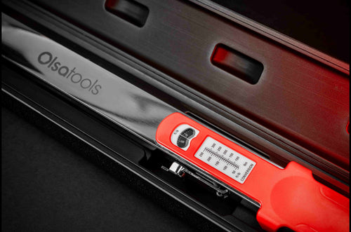 Resetting spring-style wrenches between uses